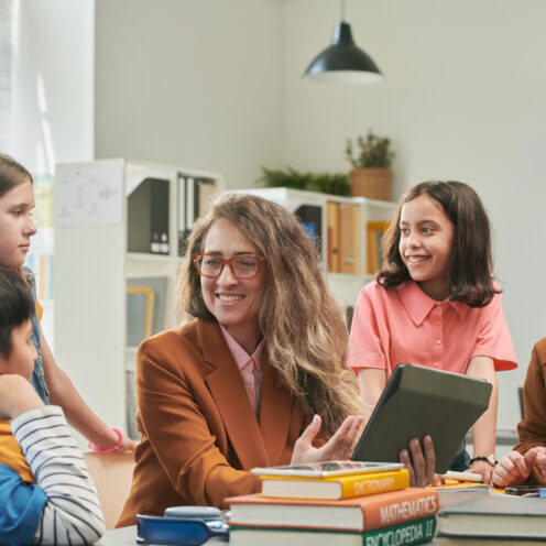 Teacher Enjoying Class with Group of Children